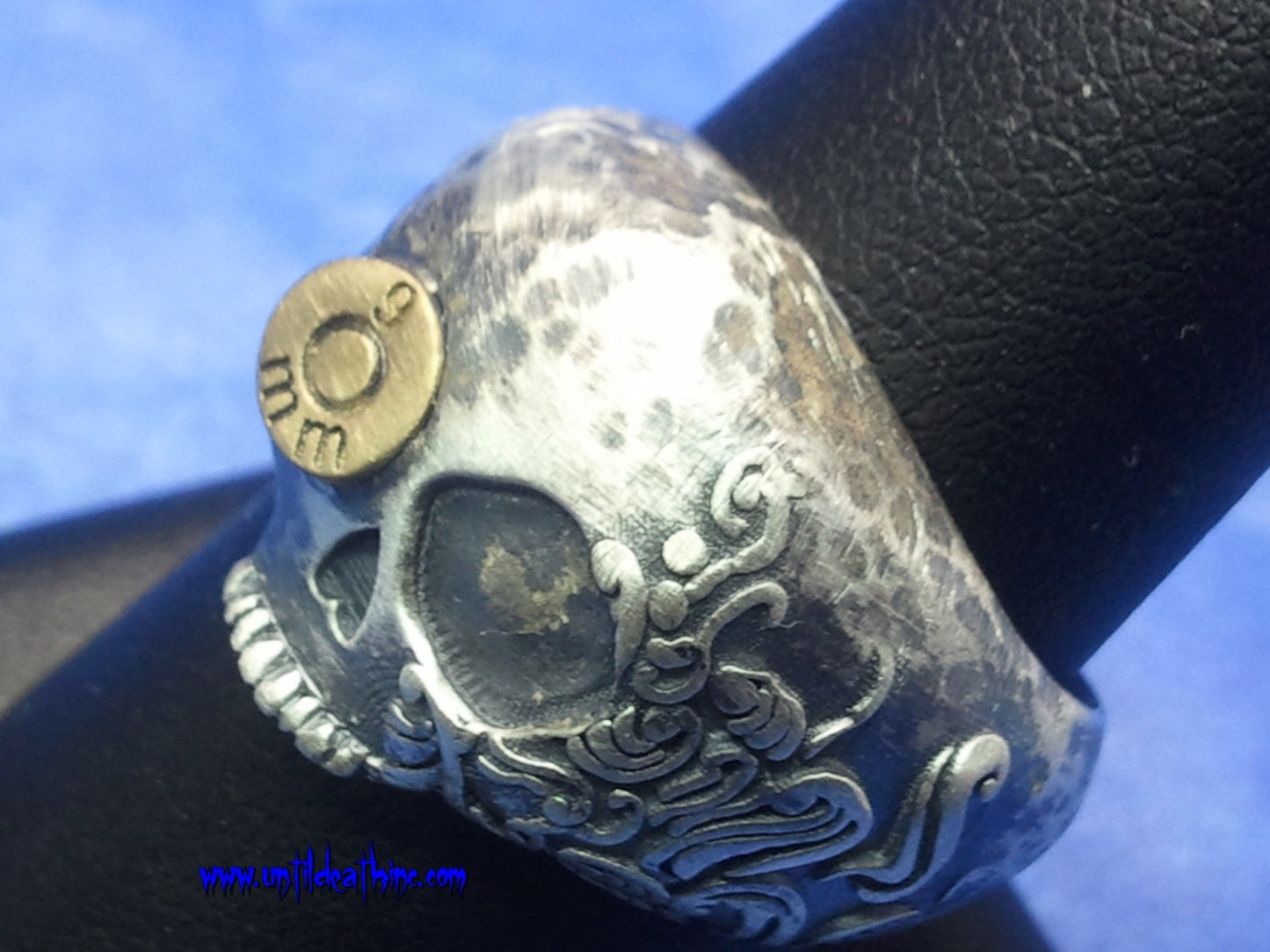 Hammered Fiji Skull Ring With Bullet in Eye in STERLING SILVER-UDINC0024